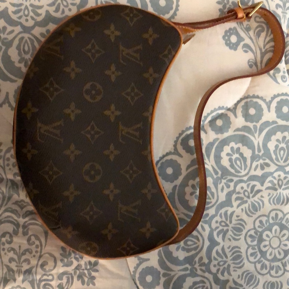 Lv small clutch like bag cute maybe used once.